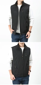 Detail of men's reversible fleece vest featuring outdoor chest embroidery and zipper pockets
