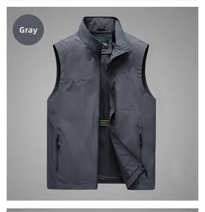 Detail view of grey outdoor vest featuring breathable mesh lining and zipper pockets