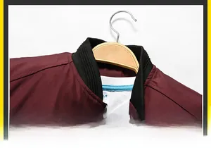 Close-up of classic black ribbed stand collar on a burgundy men's casual baseball jacket
