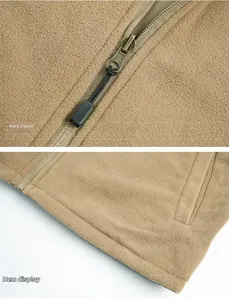 Detail view of khaki fleece vest showing high-quality reverse zipper and hem stitching