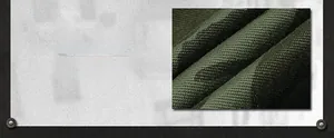 Close-up of durable military green heavy-duty cotton fabric with anti-scratch texture