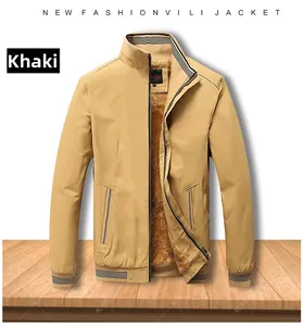 Detail of khaki men's washed jacket featuring warm brown fleece lining and ribbed cuffs
