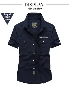 Close-up of royal blue short sleeve shirt with double chest pockets and white buttons