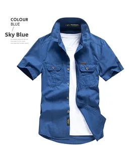 Detail of sky blue cotton shirt featuring double flap pockets and durable collar texture