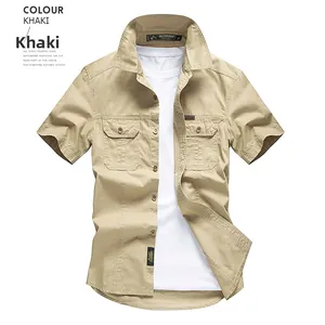 Detail of khaki outdoor cotton shirt with chest pockets and precise stitching texture