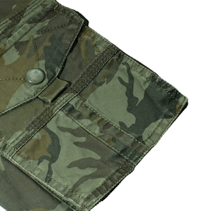 Mens woodland camo cargo shorts detail showing durable cotton fabric and flap pocket with button
