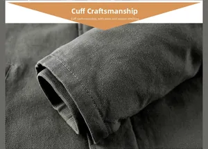 Détail d'une veste en sergé gris foncé avec coutures renforcées et poignets coupe-vent