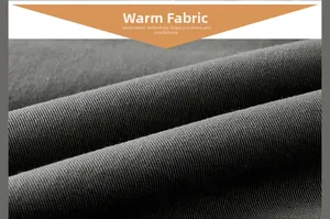 Gros plan détaillé du tissu gris foncé de la veste d'hiver avec texture sergé chaude