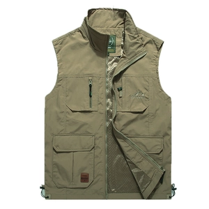 Detail of khaki outdoor fishing vest showing multi-pocket system and breathable mesh lining