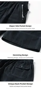 Detail view of cotton shorts featuring zipper side pockets and elastic waistband with patterns