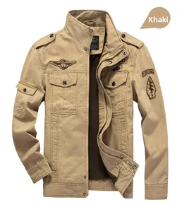 Detail of khaki military flight jacket showing shoulder straps and airborne patches
