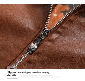 Detail view of premium metal zipper on brown leather jacket with starry pattern lining