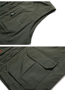 Close-up of military green outdoor vest with durable multi-pocket and embroidery detail