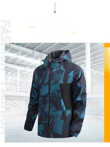 Detail of hooded windproof jacket with blue camouflage pattern and water-resistant fabric