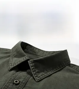 Detailed macro shot of army green cotton cargo shirt collar with premium stitching