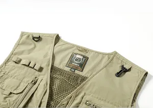 Detail of khaki mesh vest featuring breathable inner lining and durable zipper pockets