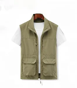 Detailed view of khaki fishing vest showing cargo pockets and heavy-duty front zipper