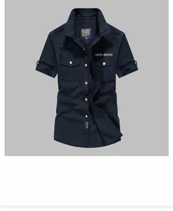 Detailed view of navy cotton work shirt featuring double chest pockets and embroidery