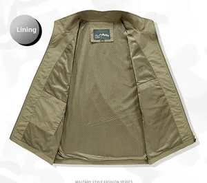 Detailed view of breathable khaki mesh lining on a multi-pocket outdoor fishing vest