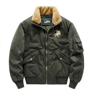 Men's green bomber jacket with brown fleece collar and monster footprint patch