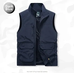 Detail of deep blue fishing vest with mesh lining and utility flap pockets