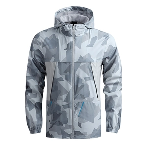 Men's hooded windbreaker with grey camouflage print, waterproof fabric, and full zip