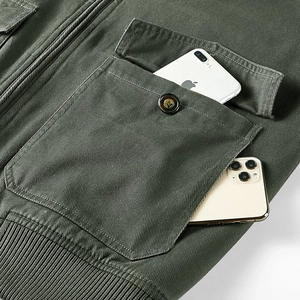 Army green winter cargo jacket with large capacity pockets and ribbed cuffs detail