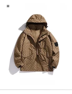 Detail of khaki windbreaker showing all-over letter print and sport outdoor sleeve patch