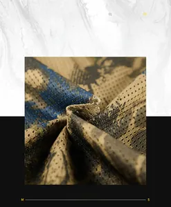 Close-up of breathable mesh fabric with camouflage pattern for outdoor fishing vest
