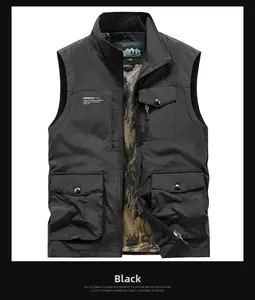 Detail of black tactical outdoor vest showing camouflage mesh lining and utility pockets