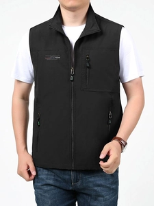 Gilet de sport noir pour homme avec multi-poches, col montant et séchage rapide