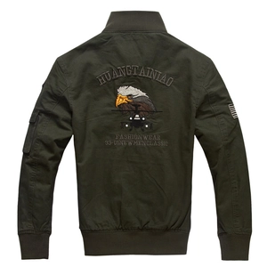 Detailed back view of army green bomber jacket with bird and helicopter embroidery