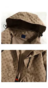 Detail view of khaki monogram jacket featuring breathable mesh lining and striped webbing decoration
