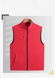 Detail of red outdoor vest showing windproof stand collar and chest zipper pocket