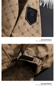 Detail of khaki outdoor jacket featuring a 3D sport arm patch and high-quality zip closure