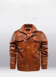 Close-up of brown PU leather jacket featuring military patches and ribbed flight collar