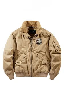 Detail of khaki pilot jacket with brown fleece collar, embroidery patch, and utility pocket
