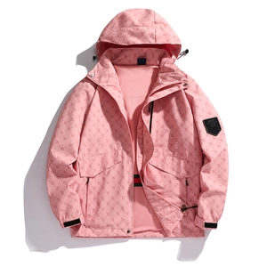 Coupe-vent rose à capuche avec motif de lettres et emblème sport pour l'extérieur