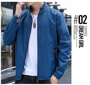 Detail of navy blue men's sun protection jacket with M logo on sleeve and zipper