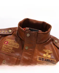 Detail of brown PU leather jacket with U.S. ARMY embroidery and star shoulder patches