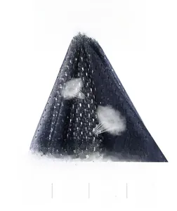 Detailed macro view of dark grey breathable mesh fabric for professional work vests