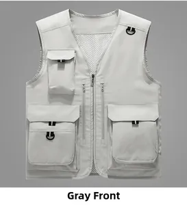 Detail view of grey outdoor utility vest with mesh lining and multiple functional pockets
