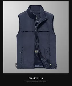Detail of dark blue cargo vest featuring stand collar, mesh lining and adjustable drawstring hem