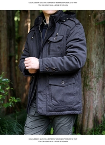 Detail of fleece lining and multi-pocket design on casual hooded winter jacket for men