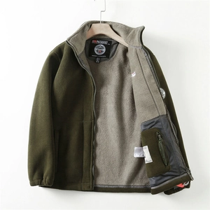 Detail of olive fleece jacket showing zipper inner pocket and warm gray lining
