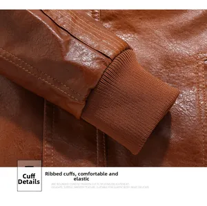 Detail of the brown leather jacket featuring elastic ribbed cuffs and premium stitching