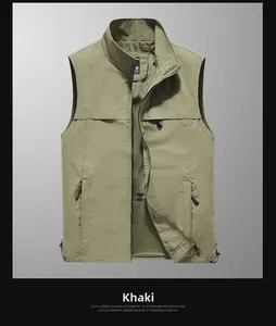 Detail of khaki outdoor vest showing mesh lining and functional zipper pockets