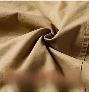 Detailed view of khaki twill bomber jacket fabric showing durable and soft cotton texture