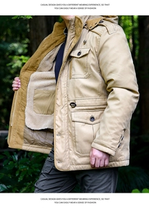 Detail of khaki hooded jacket with thick fleece lining and cargo pockets for winter