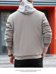 Detailed back view of a men waffle jacket with a contrasting dark grey hood and ribbed cuffs